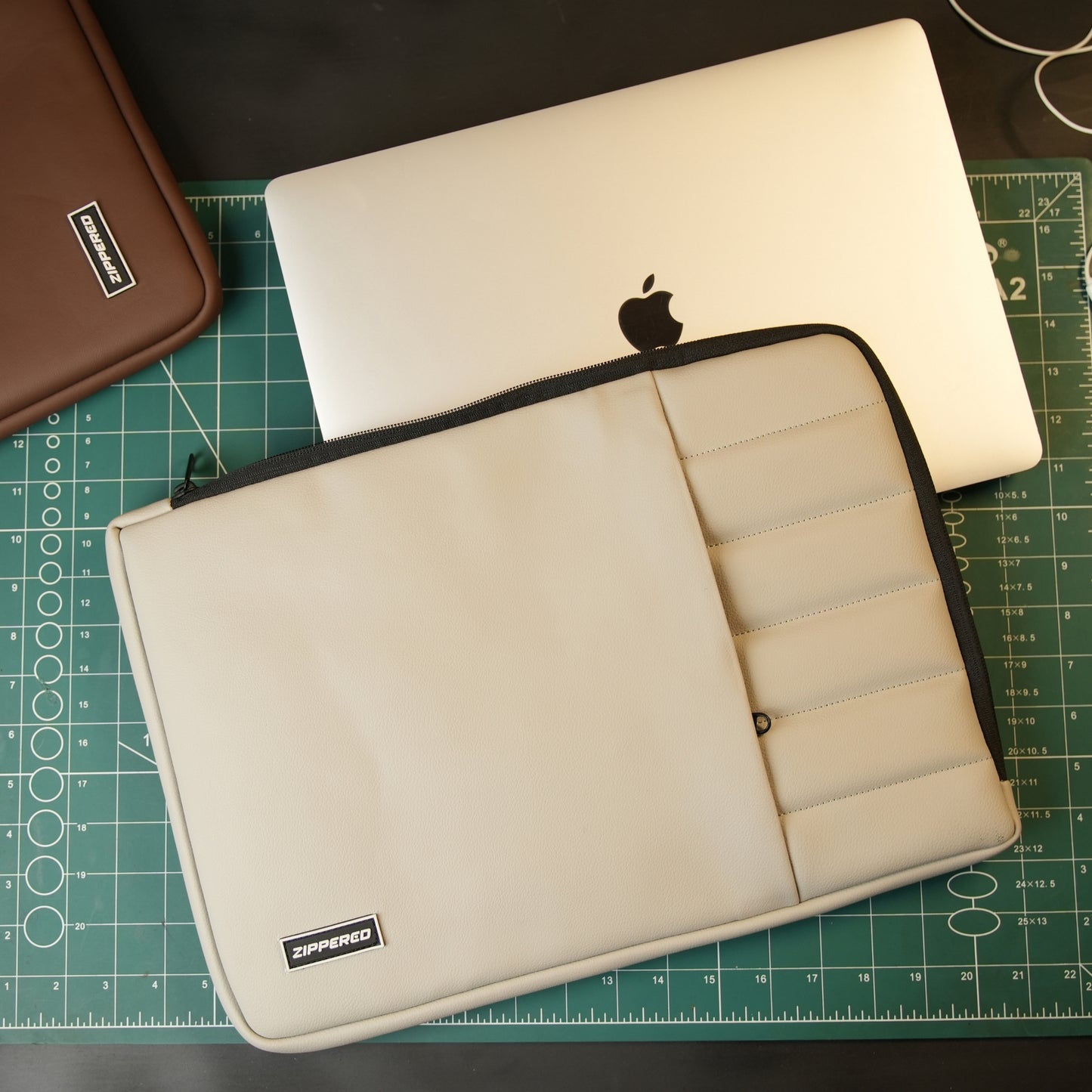 Premium grey leather laptop sleeve with accessory pocket and ultra soft inner for MacBook and laptops in Pakistan