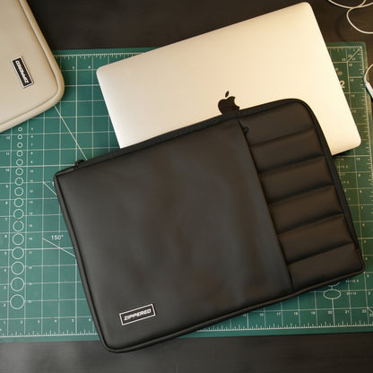Premium black leather laptop sleeve with accessory pocket and ultra soft inner for MacBook and laptops in Pakistan