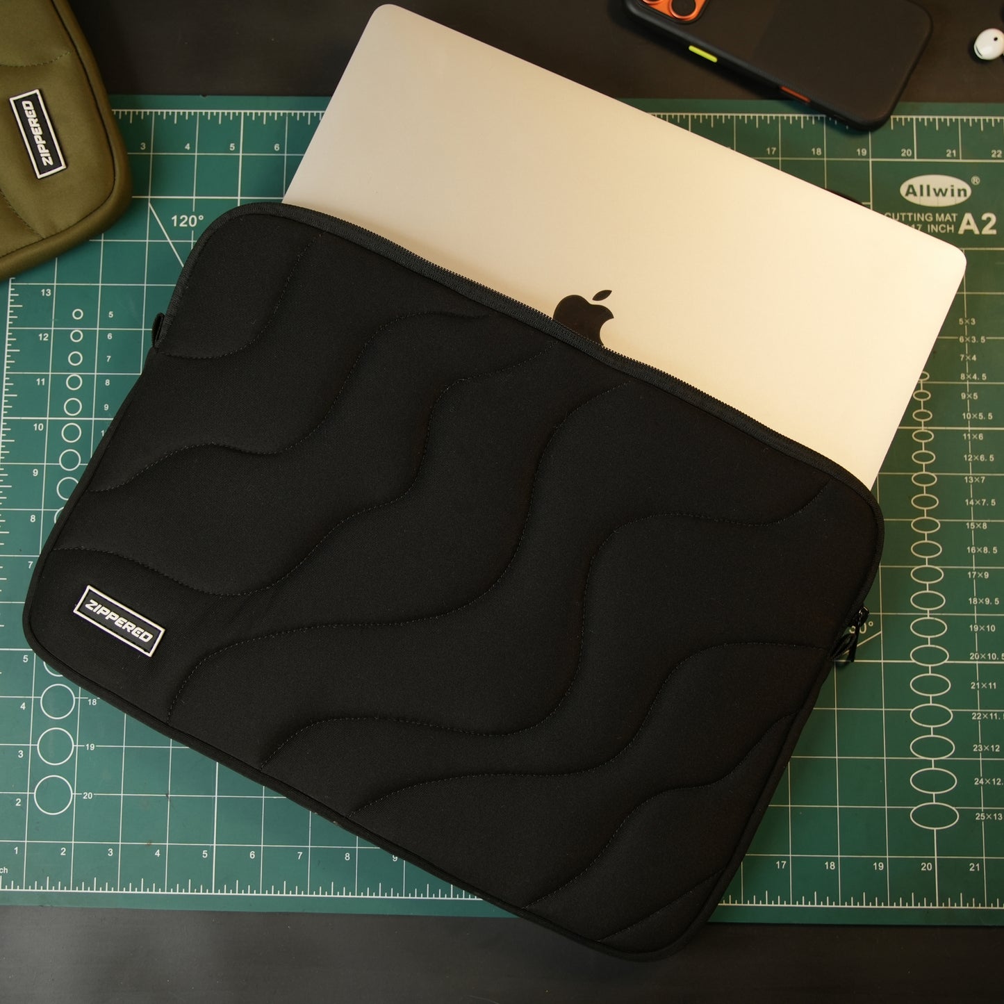 Black premium quilted laptop sleeve with zipper – premium padded laptop sleeve for MacBook & laptops in Pakistan by ZIPPERED