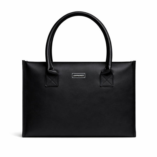 Premium black leather tote bag for women with spacious design and comfortable shoulder handles – luxury tote bag in Pakistan