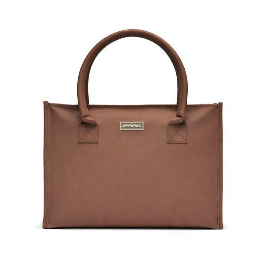 Premium brown leather tote bag for women with spacious design and comfortable shoulder handles – luxury tote bag in Pakistan