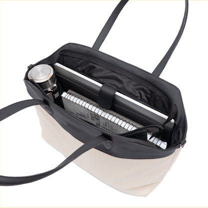 ivory and black leather tote bag interior compartments laptop pocket and water bottle pocket
