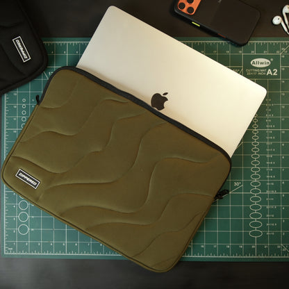 premium olive green quilted laptop sleeve with zipper – premium padded laptop sleeve for MacBook & laptops in Pakistan by ZIPPERED