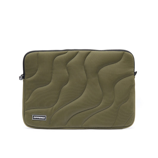 green quilted laptop sleeve with zipper – premium padded laptop sleeve for MacBook & laptops in Pakistan by ZIPPERED